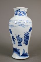 A Chinese blue and white baluster vase in the Qing dynasty manner, painted in underglaze blue with a