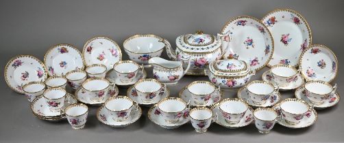 A Regency Staffordshire china part tea service with floral painted and gilded decoration, comprising