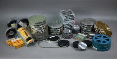 A collection of over thirty vintage 16mm film-reels, including Mickey Mouse, Felix the Cat,