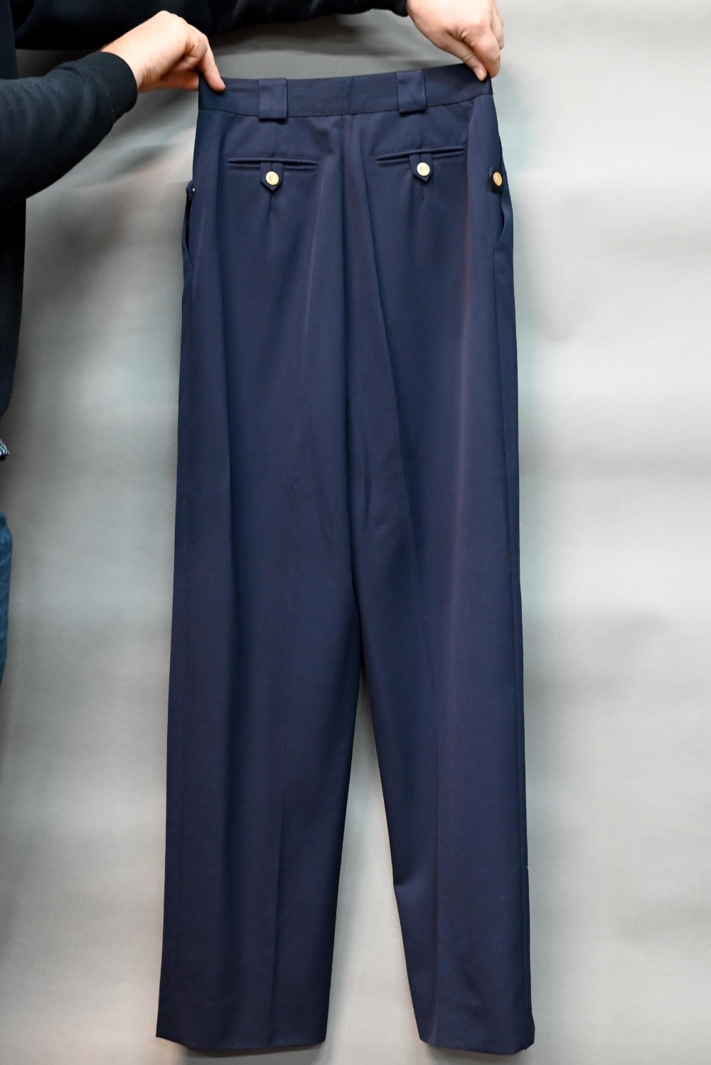 Chanel - A pair of navy trousers, with pleated front and gilt metal button detailing, fully lined, - Image 2 of 6