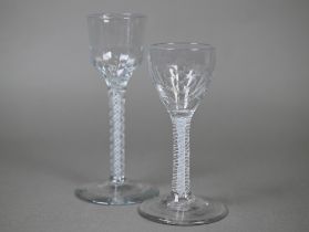 A cordial glass with half-fluted ogee bowl on opaque twist stem, 15 cm, to/w another glass with
