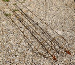 A pair of weathered steel arrow-head garden obelisks, approx. 200 cm x 23 cm