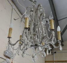 A Continental six branch painted metal electrolier chandelier hung with facetted glass drops, approx