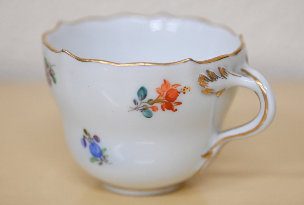 A pair of Delft blue and white candlesticks 24 cm high to/w a Meissen coffee cup and two saucers, - Image 6 of 6