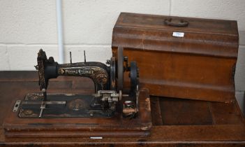 An antique Frister & Rossman sewing machine