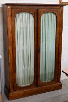 Oak bookcase with glazed doors enclosing three fixed shelves, 102 x 32 x 152 cm high