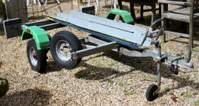 A galvanised twin motorcycle trailer c/with spare wheels and light board - a/f