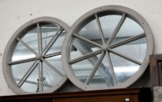 A pair of 'Cartwheel' mirrors in grey painted frames, 85 cm diam