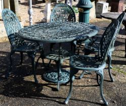 A Victorian style green painted five-piece green terrace dining set comprising a table and four