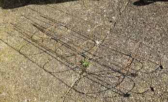 A pair of weathered steel ball-head garden obelisks, approx. 210 cm x 33 cm