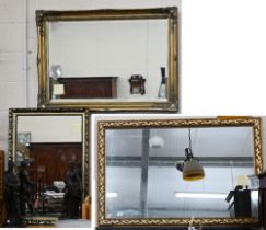 Two modern rectangular wall mirrors with decorative foliate moulded gilt frames, 120 x 78 cm and 110