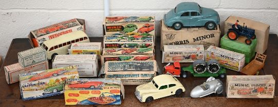 A collection of boxed Minic tinplate vehicles, including Double Deck Bus, No.2 Saloon Car, No.2