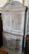 A Continental antique lime washed dresser/kitchen cabinet with panelled doors, 108 cm wide x 44 cm