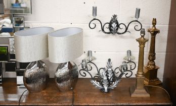 Two classical column metal table lamps to/w a pair of silvered table lamps and a set of three