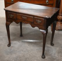 A Georgian provincial oak lowboy with three drawers on pad-footed cabriole supports, 80 x 48 x 72 cm
