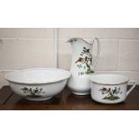 A Newport pottery (Burslem) ewer, basin and chamberpot set, printed with birds