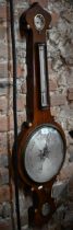 Geo Fagioli, 3 Gt. Warner St, London, a Victorian rosewood barometer with engraved silvered dial,