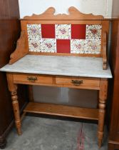 Early 20th century pine marble top wash stand with raised tiled back and two drawers on turned