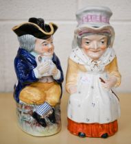 Two Staffordshire pottery lidded Toby jugs, Toby & Judy