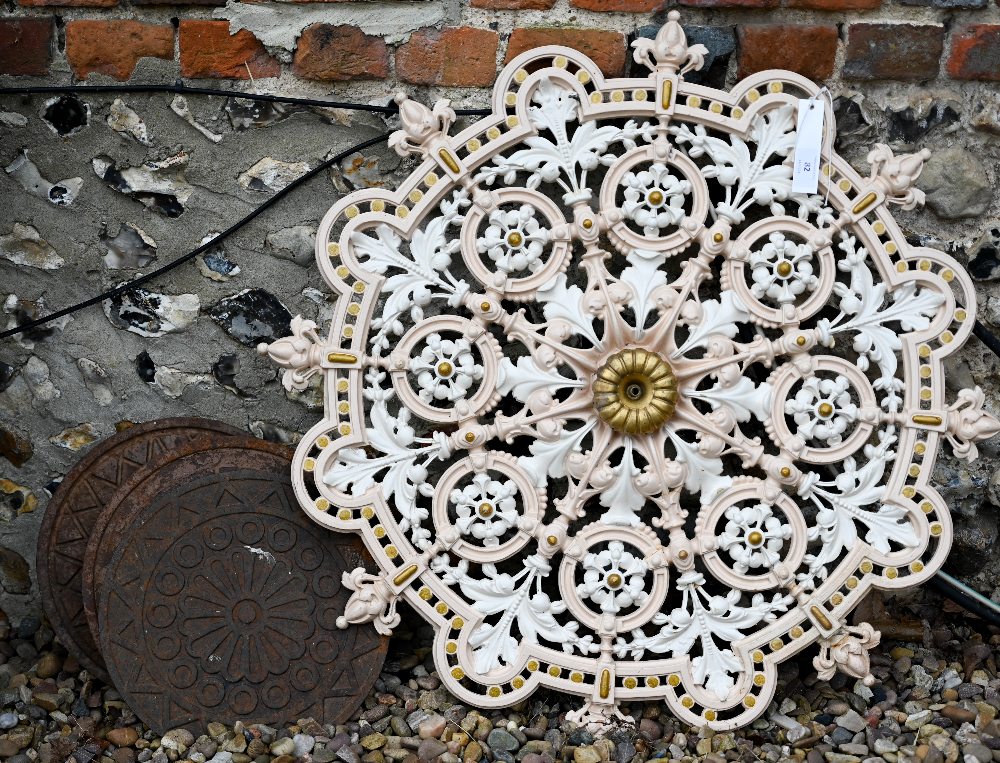 A Victorian style cast iron and painted, circular cast iron ceiling rose to/with a trio of reclaimed