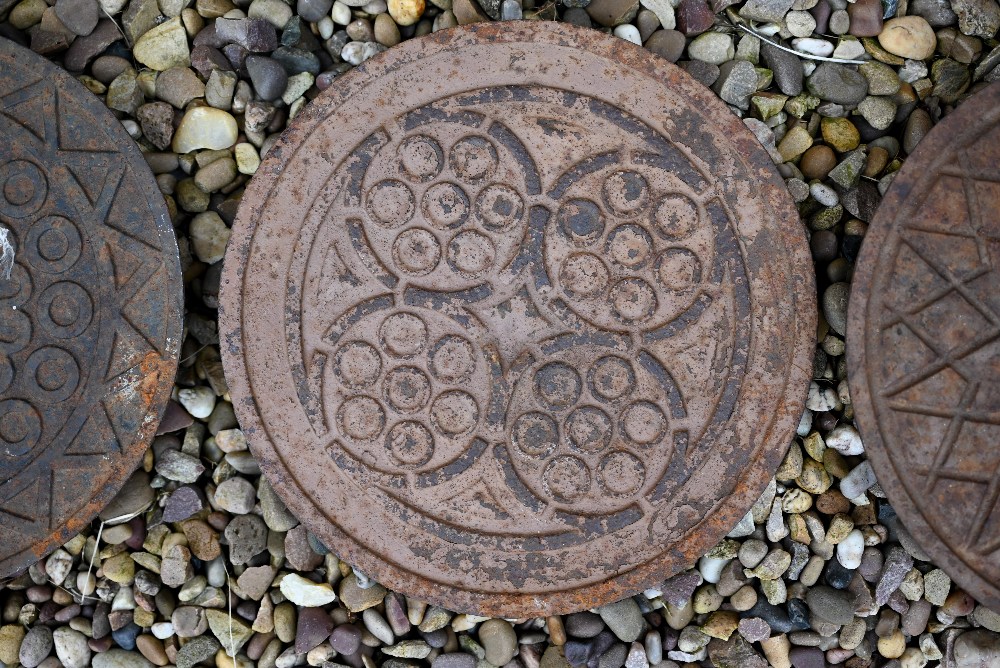 A Victorian style cast iron and painted, circular cast iron ceiling rose to/with a trio of reclaimed - Image 3 of 6