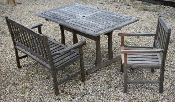 A rectangular weathered teak garden/patio table 150 cm x 90 cm x 72 cm h to/w a two-seater slatted