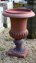 A large classical terracotta finish garden urn planter, a/f