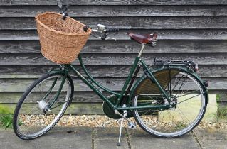 A Pashley Sovereign step-through bicycle c/with leather Brooks saddle, wicker basket and led