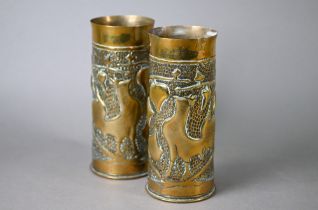Two trench-art brass shell-cases, embossed with cockerels and foliage, 17 cm high (2)
