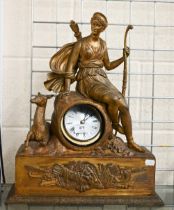 A late 19th century bronzed spelter mantel clock case, surmounted by the figure of a classical