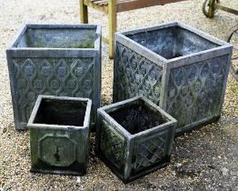 A pair of square composite garden planters to/w two smaller examples, all a/f (4)