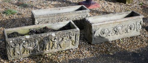 A pair of weathered cast stone planter troughs to/w another (3)