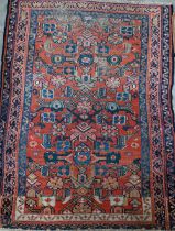 A North West Persian Heriz prayer rug, floral herati design on red ground, 96 x 70 cm