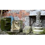 Assorted antique and later carved stone architectural fragments to/with a cast sea monster garden