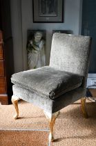 George Smith Ltd, a green fabric upholstered chair with seat cushion, raised on giltwood cabriole