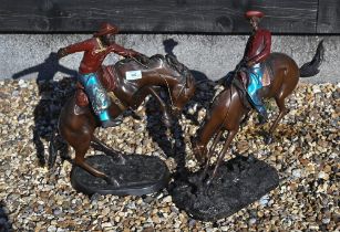 Two bronzed equestrian groups in the manner of Remington - Cowboys 'bronco busting', 50 x 47 cm