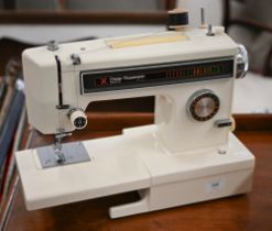A Frister & Rossman Beaver 5 electric sewing machine