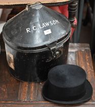 A vintage japanned tin hat-box named for R C Lawson, to/w a lady rider's top-hat by S. Patey (