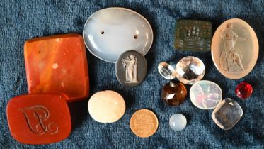 Various polished stone items, including chalcedony intaglio depicting Britannia, another with ship