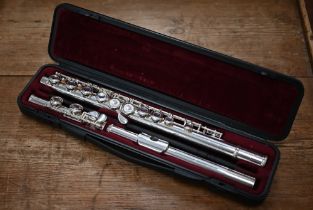 A Yamaha silver plated student flute model 211S II, in case