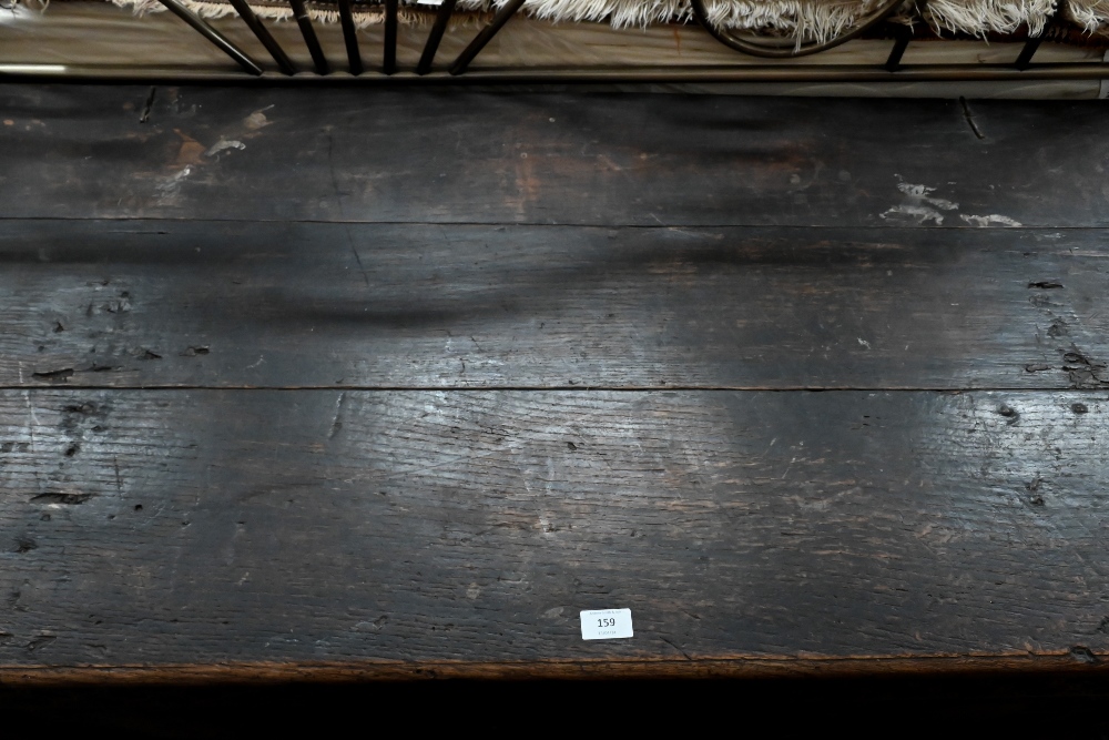 A large 18th century carved oak coffer/blanket chest (a/f), 132 cm wide x 60 cm deep x 62 cm high - Image 6 of 6