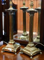 A pair of modern brass classical column table lamps, 52 cm high (2)