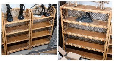 A bamboo and rattan open bookcase 120 x 40 x 152 cm high to/w a pair of similar smaller examples, 70