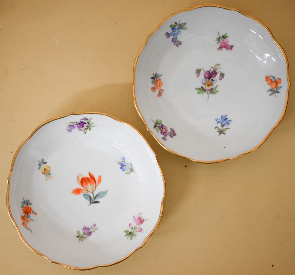 A pair of Delft blue and white candlesticks 24 cm high to/w a Meissen coffee cup and two saucers, - Image 4 of 6