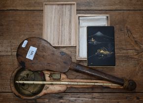 A Japanese boxed lacquered metal cigarette case with sliding hinge, decorated with Mount Fuji