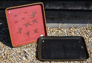An antique Japanese red lacquer and gilt papier mache tray, painted with cranes, signed, 54 cm