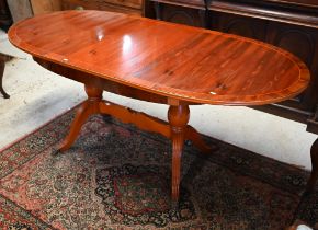 Yew veneered oval extending dining table with one leaf, 174 x 80 x 76 cm h