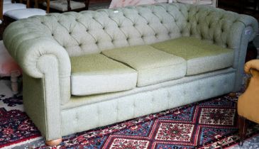 A traditional green herringbone Harris Tweed button backed Chesterfield sofa, on bun feet, 206 cm