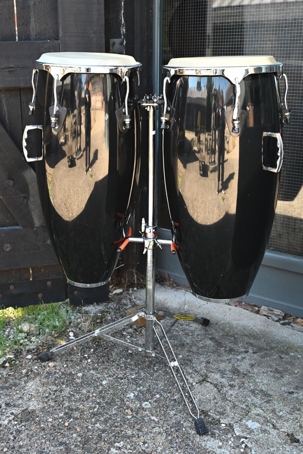 A pair of conga drums, 75 cm, on stand