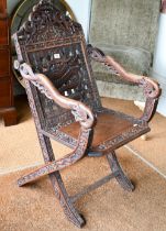 An antique Chinese carved and moulded dragon back chair with hinged seat, a/f
